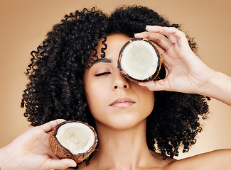 Image showing Relax woman, beauty face or coconut skincare treatment, vegan nutritionist or organic cosmetics, natural antioxidants or self care. Eyes closed, fruit oil benefits or product girl on brown background