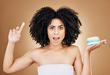 Image showing Skincare, portrait and woman shocked with cream treatment, beauty results or facial problem, crisis or risk. Skin acne breakout, lotion and studio model reaction to bad cosmetics on brown background