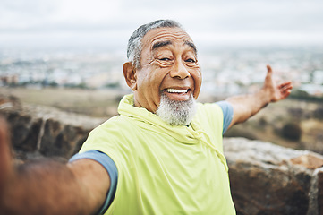 Image showing Selfie, happy and senior man hiking for health, wellness or cardio training on a mountain. Smile, nature and portrait of excited elderly male person taking a picture for outdoor trekking in woods.