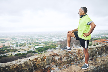 Image showing Hiking, view or senior man on mountain in nature for trekking journey or freedom adventure or wellness. Relax, holiday or mature hiker by rocks, urban sky or cliff for exercise, fitness or banner