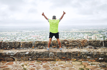 Image showing Senior man, achievement and winner for race, hike or marathon for health, wellness and fitness. City, run and thumbs up for goal, workout and victory in celebration, elderly and freedom retirement