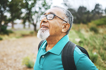 Image showing Outdoor, thinking and senior man breathing, hike and calm with retirement, peace and fitness. Elderly person, pensioner and mature guy with meditation, relax and forest with wellness, health or smile