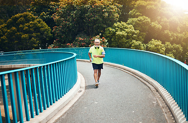 Image showing Old man on bridge, speed walking for fitness and cardio, training or running with wellness and vitality. Runner in street, performance and challenge with exercise, health and workout in retirement