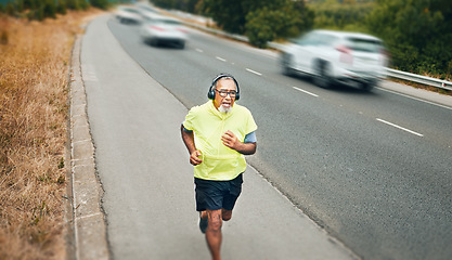 Image showing City, running and senior man with fitness, training and workout with wellness, health and headphones. Old person, athlete and runner with headset, outdoor and marathon with exercise and challenge