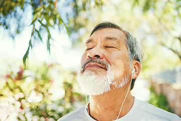 Image showing Breathe, fitness and senior man in nature on a break after a running exercise for race training. Health, sports and elderly male athlete runner after a cardio workout in outdoor park or garden.