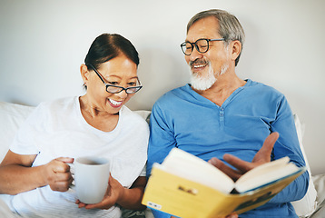 Image showing Bible, senior or happy couple reading book in prayer, support or hope in home to worship together. Bed, Asian woman or mature man learning or studying God for grace in religion with love or coffee