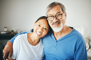 Image showing Mature, portrait or happy couple hug in home or house together to relax on holiday with bond or support. Embrace, lovers or romantic Asian man with a senior woman with love, smile or care in marriage