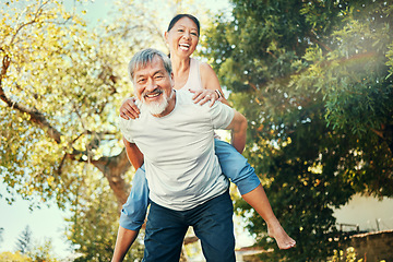 Image showing Piggy back, portrait and Asian couple in garden for bonding, healthy relationship and relaxing outdoors. Marriage, nature and senior man and woman happy, laughing and playful for love, care and fun