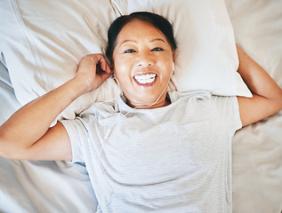 Image showing Bedroom face, music and relax happy woman sleeping, tired or nap for break, morning wellness or streaming audio podcast. Happiness, radio sound and top view person smile, rest and comfort on home bed