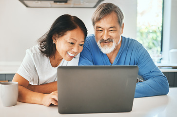 Image showing Home, smile and senior couple with a laptop, conversation and search internet with website info, network and typing. Kitchen, elderly man and old woman with a pc, email notification and connection