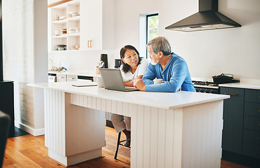 Image showing Mature couple, laptop and kitchen for home ideas, asset management and planning of finance or mortgage at home. Woman and man talking of insurance, investment and budget, cost or debt on computer