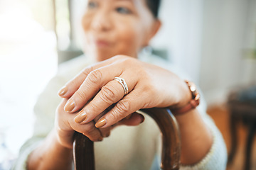 Image showing Hands, walking stick and woman in home for support, healthcare and help in retirement. Closeup, lonely widow and senior with disability with cane for parkinson, arthritis and rehabilitation of stroke