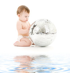 Image showing adorable baby boy with big disco ball