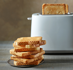 Image showing heap of toasted bread slices