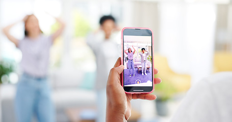 Image showing Cellphone, woman and influencer recording video for social media, vlog or online post dancing at home. Hands, phone and female content creator live streaming and moving to music in living room.