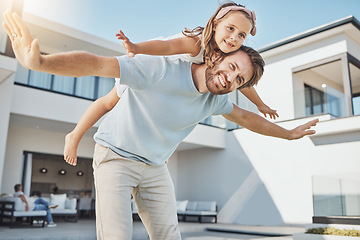 Image showing Happy family, fun and new home with excited airplane game and father with child outdoor. Relax, real estate and love of a dad and young kid playing together at a house with freedom and vacation