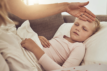 Image showing Fever, mom and sick child on sofa with temperature check, stress and health care treatment in home. Healthcare, mother and sleeping daughter on couch, hand on forehead in comfort or medical emergency