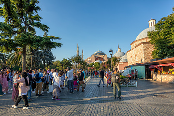 Image showing People behind Hagia Sophia or Ayasofya (Turkish), Istanbul, Turkey.