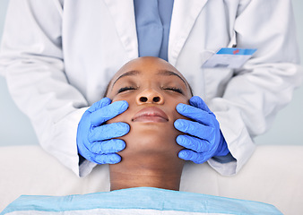 Image showing Massage, hands and a skin analysis on a black woman from a doctor for healthcare or dermatology. Spa, wellness and an African patiennt with a facial rub from a medical employee for a cleaning