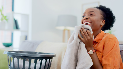 Image showing Clean, smell and happy woman with laundry in home or basket with clothes, linen or maid spring cleaning in apartment. Black person, washing or clothing with detergent or cleaner scent on fresh fabric