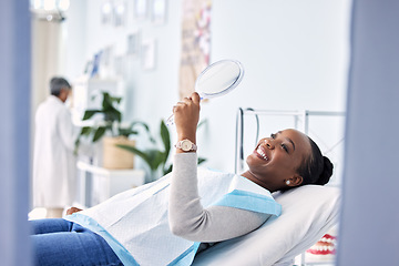 Image showing Smile, mirror and black woman at dentist on chair in clinic, tooth treatment and cleaning. Reflection, dental orthodontics and happy person teeth whitening, oral hygiene and healthcare for wellness