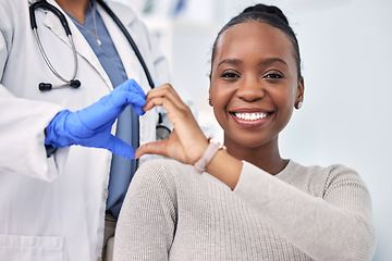 Image showing Black woman, patient and doctor with smile, consultation and heart emoji for cardio health, checkup and appointment. Happiness, support and wellness for medicine, healthcare and physical examination