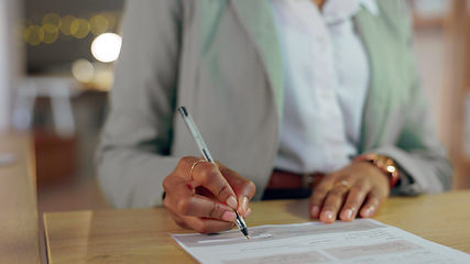 Image showing Woman, hands and writing signature for business contract, application or form with pen at night on office desk. Closeup of female person filling documents or signing paperwork for legal agreement