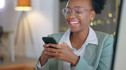 Image showing Business woman, laugh and typing on cellphone for mobile chat, social networking and digital contact at night. Happy african worker scroll on smartphone, reading funny news and search media in office