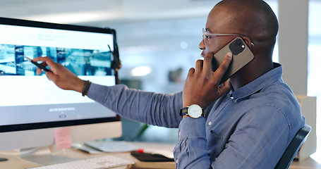 Image showing Businessman, phone call and pointing at computer in office while talk, consult or listen. Black person, analyst or developer for customer service with communication, feedback or support on website
