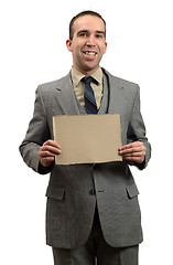 Image showing Businessman Holding Cardboard Sign