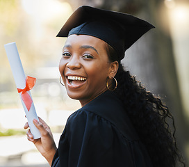 Image showing Graduation, diploma and portrait of happy black woman celebrate success, education and college scholarship outdoor. University graduate smile with certificate, award and certified student achievement
