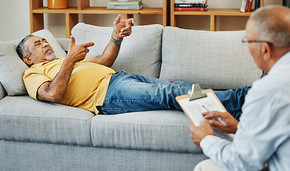 Image showing Old man, psychologist counseling and sofa with trauma stress or mental health, violence or depressed. Elderly veteran, therapist and support or helping advice, talking or anxiety, problem or fear