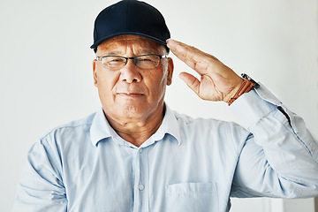 Image showing Old man, salute and portrait for veteran soldier on white background for gratitude, pride or respect. Elderly male, army hero power and military or hand gesture for patriotic courage, war or service