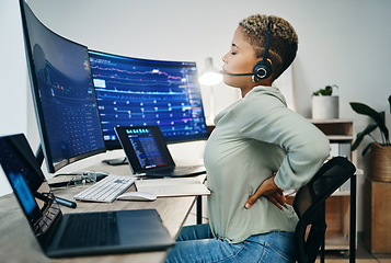Image showing Back pain, call center and woman working on computer with stress, fatigue and overworked in an office with strain. Burnout, tired and telemarketing employee with pressure from crisis or injury