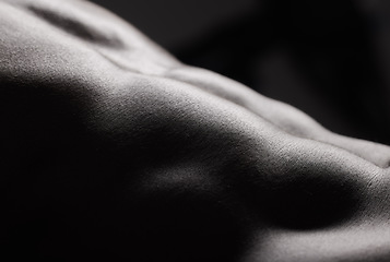 Image showing Fitness, black man and torso with abdomen in studio for wellness, stomach and body on dark background. Person, muscle and bodybuilder with six pack for healthy lifestyle or strength and closeup