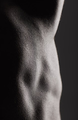 Image showing Fitness, man and torso with closeup in studio for wellness, stomach and body on dark background. Person, muscle or bodybuilder with six pack for healthy lifestyle and strength for abdomen or topless