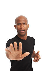 Image showing Portrait, man and hand gesture for stop for warning, order and threat in close up by white background. Black model, authority and body language with attention, danger or protest for protect in studio
