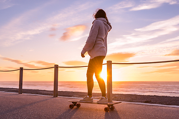 Image showing Girl riding a skateboard 