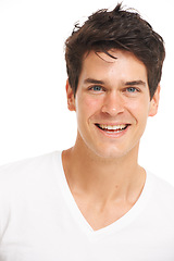 Image showing Face, portrait and sexy young man with fashion, skincare and happiness with white studio background. Caucasian model, smile and clean aesthetic with glow, spa and cosmetic with t-shirt in close up