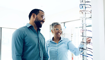 Image showing Optometry, glasses and woman with patient for decision, choice and eye care option in optician store. Healthcare, ophthalmology and people in clinic to choose prescription lens, spectacles and frames