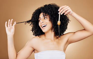 Image showing Honey, hair and beauty portrait of woman with natural, care and oil treatment on studio background with happiness. Happy, African haircare and product with honeycomb moisture and sugar benefits