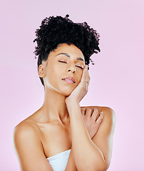 Image showing Natural beauty, woman touching face and dermatology with clean skin, wellness and glow on pink background. Skincare, antiaging and cosmetics care, spa treatment and fresh with hygiene in studio