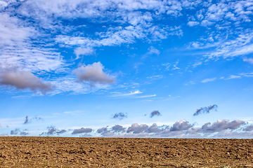 Image showing autumn field with sky with clouds