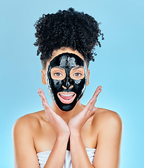 Image showing Skincare, charcoal mask and portrait of woman for facial treatment, anti aging detox and wellness. Beauty, studio and face of person with products for health, cosmetics or grooming on blue background