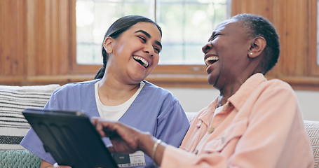 Image showing Happy woman, doctor and tablet in elderly care or laughing for funny joke, social media or meme on sofa at home. Female person, nurse or medical caregiver smile with technology for fun entertainment
