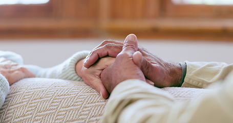 Image showing Senior couple, holding hands and love closeup with empathy, kindness and care in a home. Retirement, marriage hope and elderly people together with trust and support for healing and helping in house