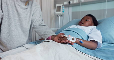 Image showing Kid, patient and hospital with comfort by parent for care, treatment or wellness in medicine with IV drip. African, boy or youth in clinic for diagnosis, results and mother for love, trust or support