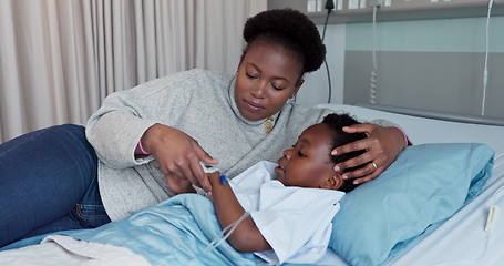 Image showing Hospital, bed and mother with child for comfort, compassion and care with iv drip for surgery. Healthcare, African family and mom with support for kid for medical service, wellness and treatment