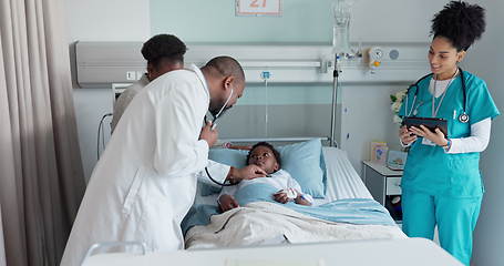 Image showing Man, doctor and child patient in health checkup for medical diagnosis, illness or appointment on hospital bed. Male person, nurse or surgeon monitoring, checking kid or little boy heart beat or rate