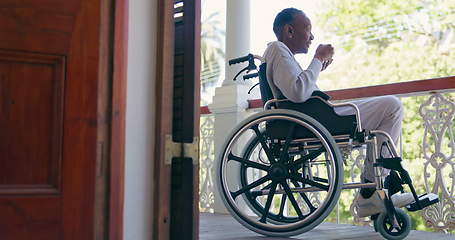 Image showing Senior woman, tea and wheelchair with thinking, vision and ideas on balcony, morning and drink in retirement. Coffee, relax and elderly person with disability, coffee cup and wellness in nursing home